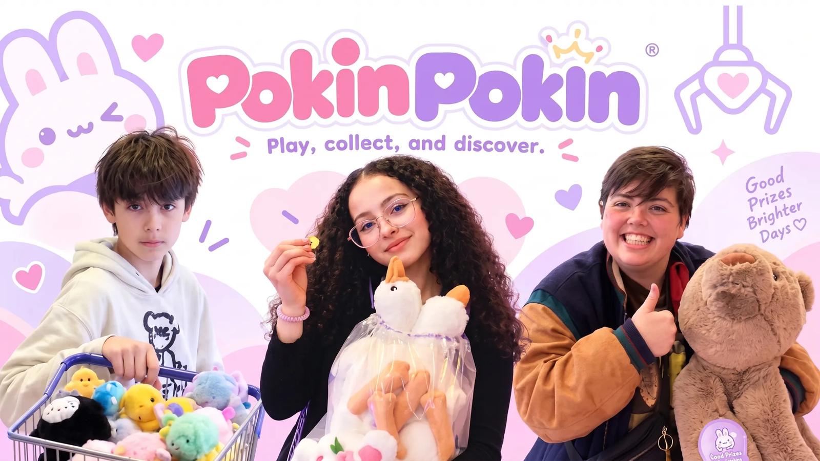 Three people posing with plush toys in front of a pink Pokin Pokin promotional backdrop.